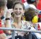 Amanda Knox, center, who was acquitted of murder charges in the 2007 death of her British roommate Meredith Kercher, in Perugia, Italy, smiles as she attends a Copa America Centenario soccer match between Haiti and Peru, Saturday, June 4, 2016, in Seattle. (ANSA/AP Photo/Ted S. Warren) [CopyrightNotice: Copyright 2016 The Associated Press. All rights reserved. This material may not be published, broadcast, rewritten or redistribu]